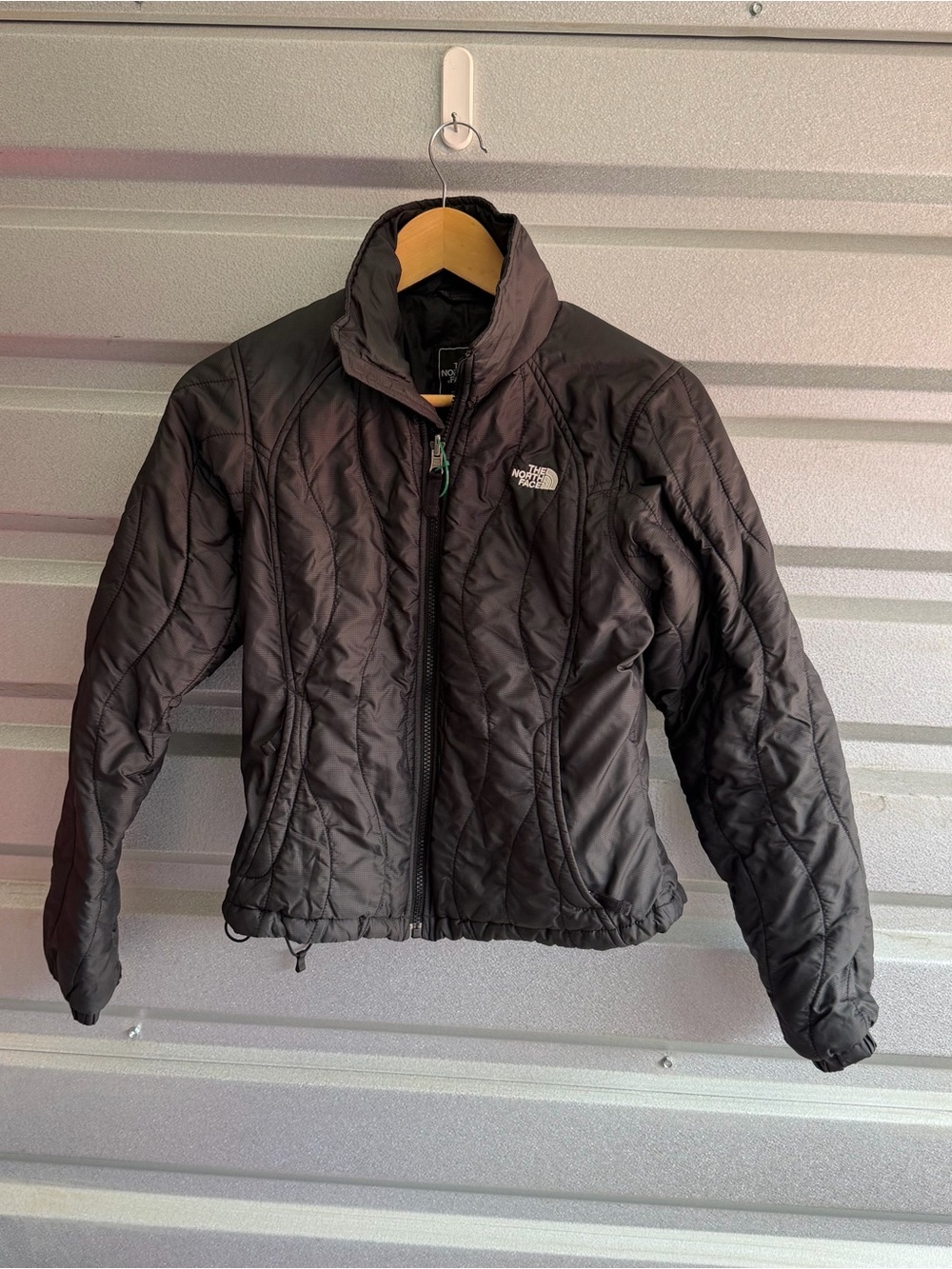 The North Face black quilted coat